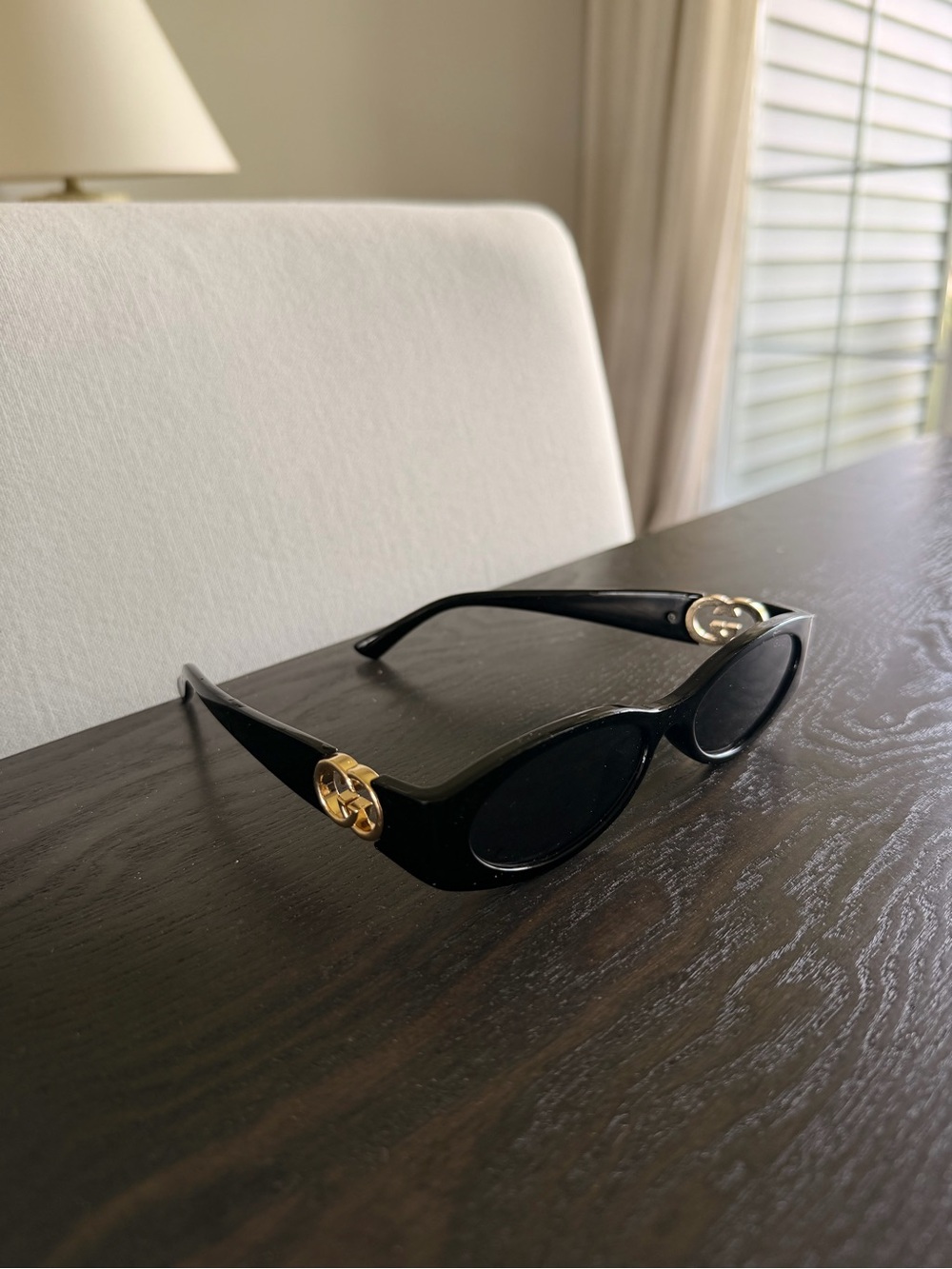 Inspired Black Cat-Eye Sunglasses with Gold Accent - Women